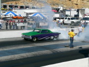 GREEN AND PURPLE NOVA Drag Car DOING A BURNOUT